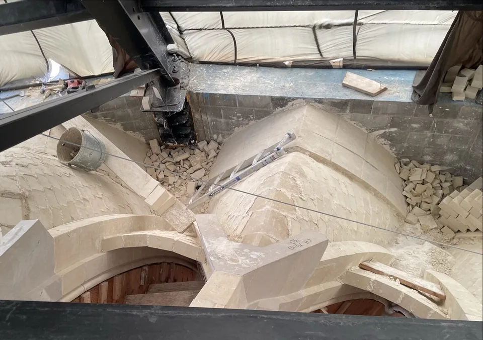 Overhead view of stone arch ribs and infill webstones on the Chapel's vaulted ceiling