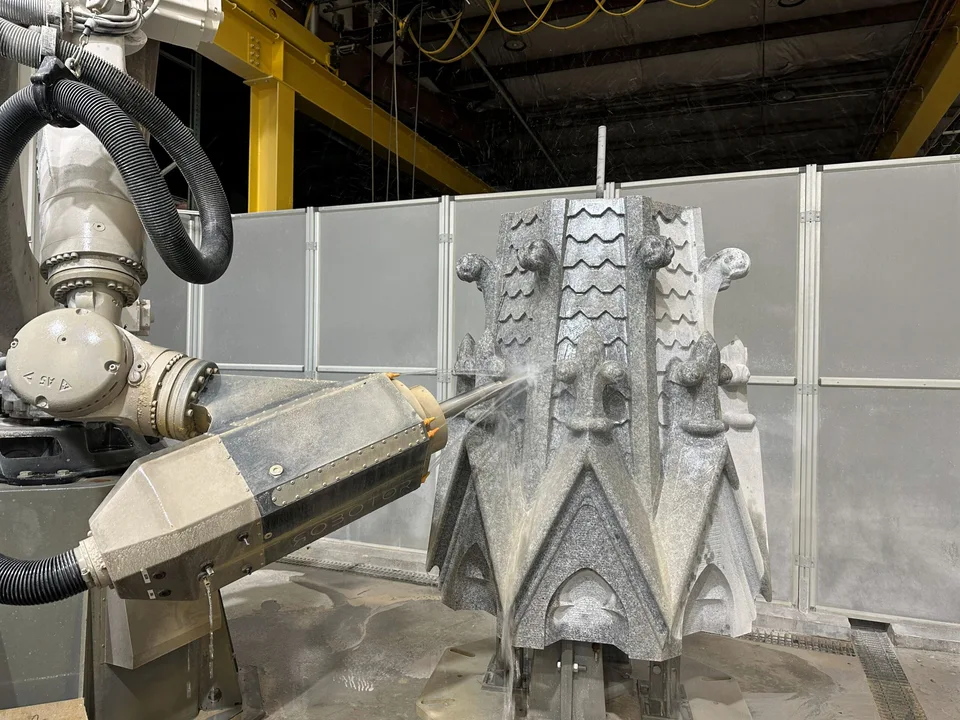 Carving part of a granite pinnacle